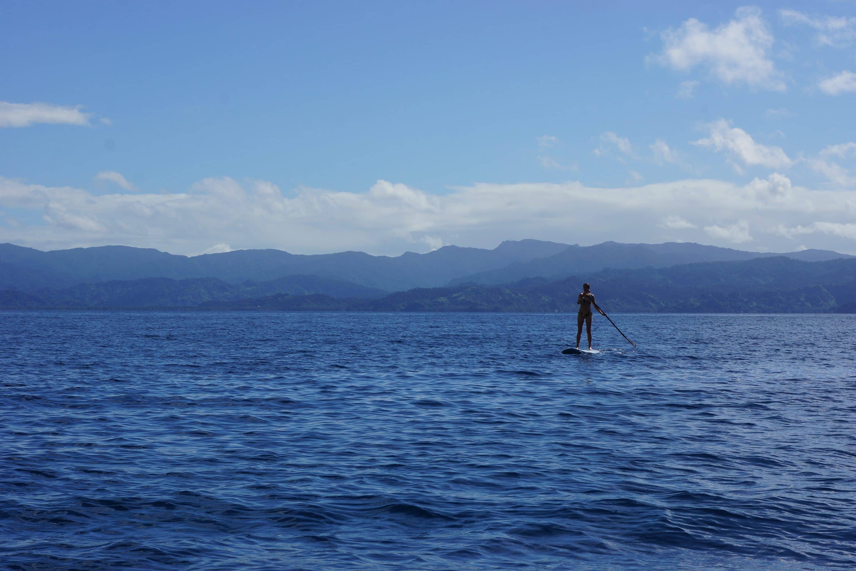 paddle boarding off the coast of Fiji